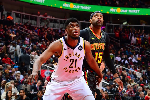 ATLANTA, GA - DECEMBER 26: Thaddeus Young #21 of the Indiana Pacers and Vince Carter #15 of the Atlanta Hawks fights for position on December 26, 2018 at State Farm Arena in Atlanta, Georgia.  NOTE TO USER: User expressly acknowledges and agrees that, by downloading and/or using this Photograph, user is consenting to the terms and conditions of the Getty Images License Agreement. Mandatory Copyright Notice: Copyright 2018 NBAE (Photo by Scott Cunningham/NBAE via Getty Images)