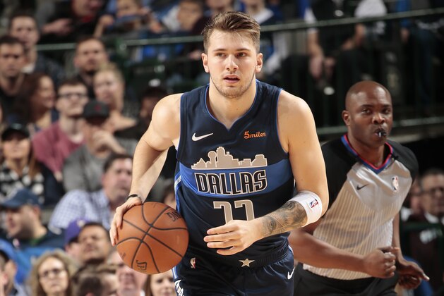 DALLAS, TX - DECEMBER 26: Luka Doncic #77 of the Dallas Mavericks handles the ball against the New Orleans Pelicans on December 26, 2018 at the American Airlines Center in Dallas, Texas. NOTE TO USER: User expressly acknowledges and agrees that, by downloading and or using this photograph, User is consenting to the terms and conditions of the Getty Images License Agreement. Mandatory Copyright Notice: Copyright 2018 NBAE (Photo by Glenn James/NBAE via Getty Images)