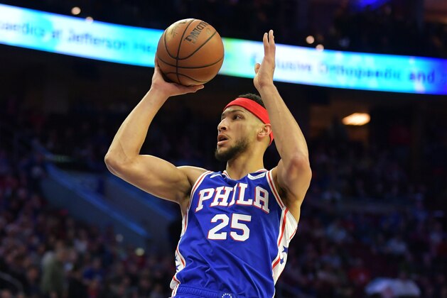 PHILADELPHIA, PENNSYLVANIA - DECEMBER 19: Ben Simmons #25 of the Philadelphia 76ers puts up a jump shot against the New York Knicks at Wells Fargo Center on December 19, 2018 in Philadelphia, Pennsylvania. NOTE TO USER: User expressly acknowledges and agrees that, by downloading and or using this photograph, User is consenting to the terms and conditions of the Getty Images License Agreement.  (Photo by Drew Hallowell/Getty Images)