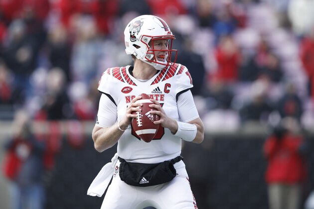 LOUISVILLE, KY - NOVEMBER 17: Ryan Finley #15 of the North Carolina State Wolfpack looks to pass the ball against the Louisville Cardinals during the game at Cardinal Stadium on November 17, 2018 in Louisville, Kentucky. The Wolfpack won 52-10. (Photo by Joe Robbins/Getty Images)
