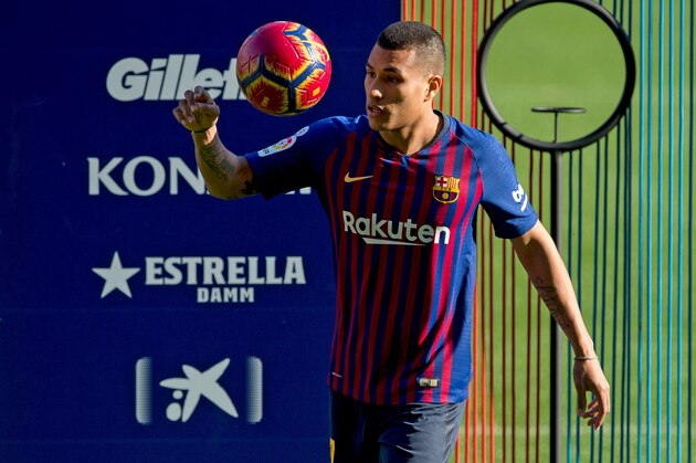 Barcelona's new player Colombian defender Jeison Murillo plays with a ball during his official presentation at the Camp Nou stadium in Barcelona on December 27, 2018. (Photo by Josep LAGO / AFP)        (Photo credit should read JOSEP LAGO/AFP/Getty Images)