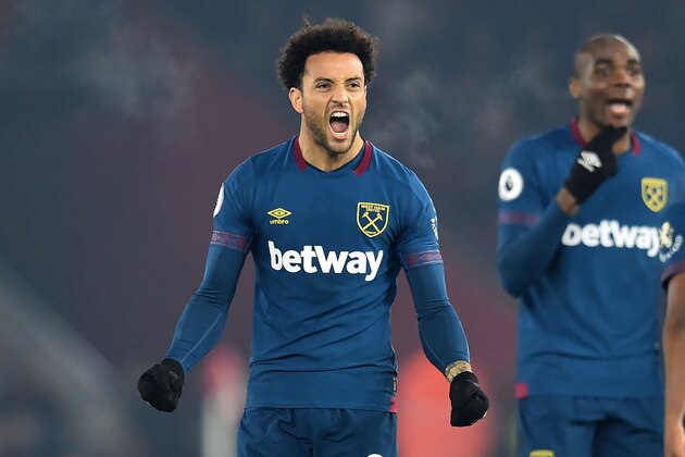 West Ham United's Brazilian midfielder Felipe Anderson celebrates after scoring their first goal during the English Premier League football match between Southampton and West Ham United at St Mary's Stadium in Southampton, southern England on December 27, 2018. (Photo by Glyn KIRK / AFP) / RESTRICTED TO EDITORIAL USE. No use with unauthorized audio, video, data, fixture lists, club/league logos or 'live' services. Online in-match use limited to 120 images. An additional 40 images may be used in extra time. No video emulation. Social media in-match use limited to 120 images. An additional 40 images may be used in extra time. No use in betting publications, games or single club/league/player publications. /         (Photo credit should read GLYN KIRK/AFP/Getty Images)