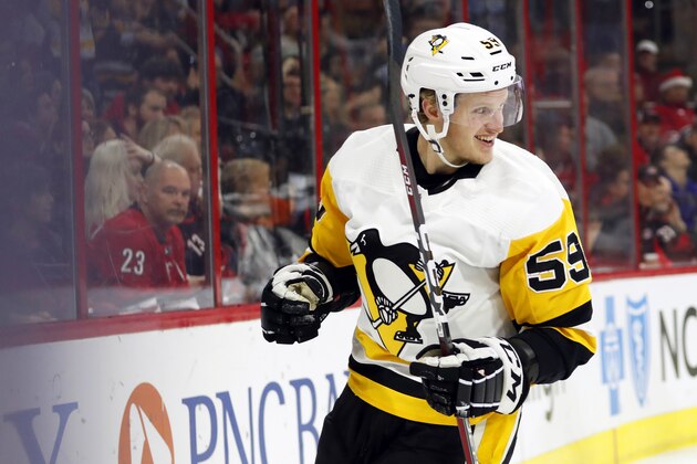 Pittsburgh Penguins' Jake Guentzel (59) celebrates his goal against the Carolina Hurricanes during the second period of an NHL hockey game, Saturday, Dec. 22, 2018, in Raleigh, N.C. (AP Photo/Karl B DeBlaker)