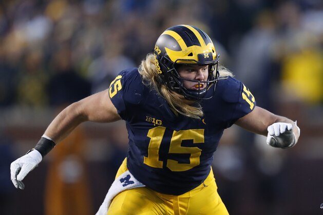Michigan defensive lineman Chase Winovich plays against Penn State in the second half of an NCAA college football game in Ann Arbor, Mich., Saturday, Nov. 3, 2018. (AP Photo/Paul Sancya)