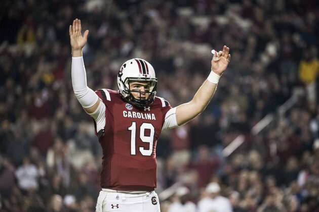South Carolina quarterback Jake Bentley (19) celebrates a touchdown during the first half of the team's NCAA college football game against Chattanooga on Saturday, Nov. 17, 2018, in Columbia, S.C. (AP Photo/Sean Rayford)