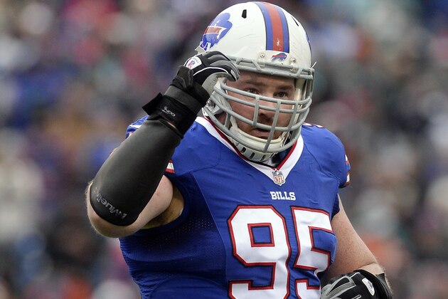 Buffalo Bills defensive tackle Kyle Williams (95) celebrates a defensive stop during the first half of an NFL football game Saturday, Dec. 24, 2016, in Orchard Park, N.Y. (AP Photo/Adrian Kraus)
