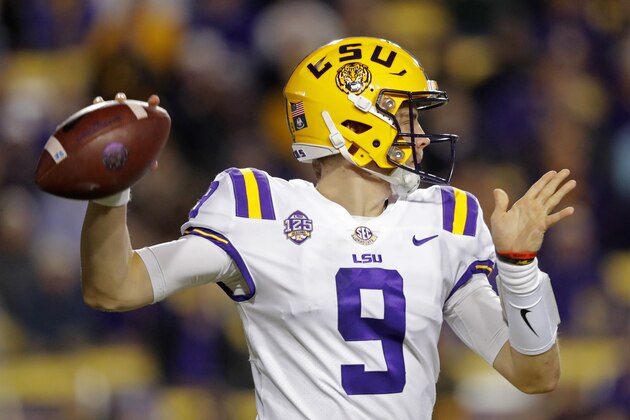 LSU quarterback Joe Burrow (9) passes in the first half of an NCAA college football game against Rice in Baton Rouge, La., Saturday, Nov. 17, 2018. (AP Photo/Gerald Herbert)