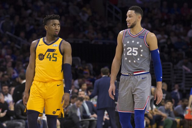 PHILADELPHIA, PA - NOVEMBER 16: Donovan Mitchell #45 of the Utah Jazz talks to Ben Simmons #25 of the Philadelphia 76ers in the third quarter at the Wells Fargo Center on November 16, 2018 in Philadelphia, Pennsylvania. The 76ers defeated the Jazz 113-107. NOTE TO USER: User expressly acknowledges and agrees that, by downloading and or using this photograph, User is consenting to the terms and conditions of the Getty Images License Agreement. (Photo by Mitchell Leff/Getty Images)
