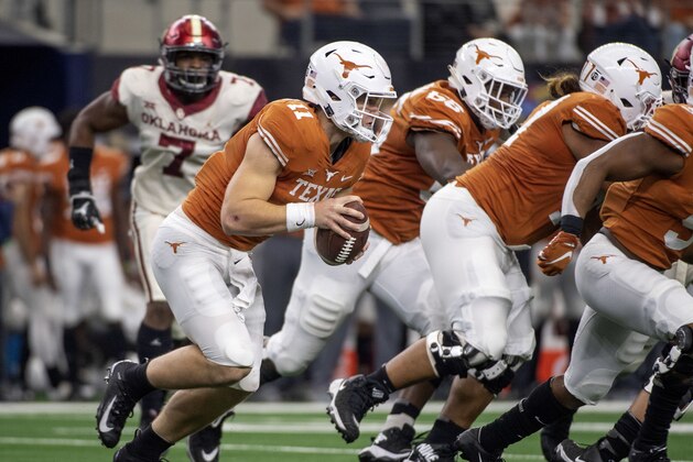 Texas quarterback Sam Ehlinger runs upfield against Oklahoma during the first half of the Big 12 Conference championship NCAA college football game on Saturday, Dec. 1, 2018, in Arlington, Texas. (AP Photo/Jeffrey McWhorter)