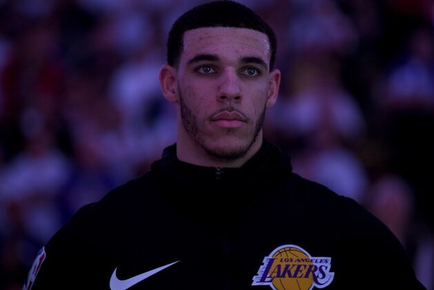 OAKLAND, CA - DECEMBER 25:  Lonzo Ball #2 of the Los Angeles Lakers stands for the National Anthem prior to the start of an NBA basketball game against the Golden State Warriors at ORACLE Arena on December 25, 2018 in Oakland, California. NOTE TO USER: User expressly acknowledges and agrees that, by downloading and or using this photograph, User is consenting to the terms and conditions of the Getty Images License Agreement.  (Photo by Thearon W. Henderson/Getty Images)