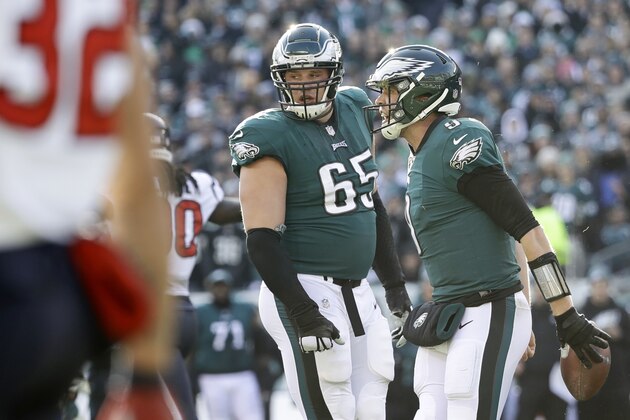 Philadelphia Eagles' Nick Foles, right, reacts near Lane Johnson after Foles was tackled by Houston Texans' Jadeveon Clowney on a two-point conversion attempt during the first half of an NFL football game, Sunday, Dec. 23, 2018, in Philadelphia. (AP Photo/Matt Rourke)