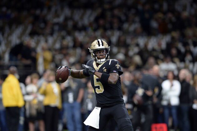 New Orleans Saints quarterback Teddy Bridgewater (5) warms up before an NFL football game against the Atlanta Falcons in New Orleans, Thursday, Nov. 22, 2018. (AP Photo/Bill Feig)