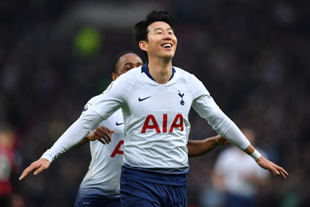 Tottenham Hotspur's South Korean striker Son Heung-Min celebrates scoring their second goal during the English Premier League football match between Tottenham Hotspur and Bournemouth at Wembley Stadium in London, on December 26, 2018. (Photo by Ben STANSALL / AFP) / RESTRICTED TO EDITORIAL USE. No use with unauthorized audio, video, data, fixture lists, club/league logos or 'live' services. Online in-match use limited to 120 images. An additional 40 images may be used in extra time. No video emulation. Social media in-match use limited to 120 images. An additional 40 images may be used in extra time. No use in betting publications, games or single club/league/player publications. /         (Photo credit should read BEN STANSALL/AFP/Getty Images)