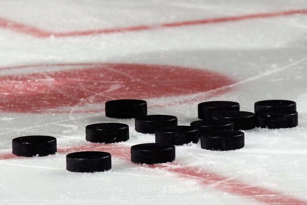 NEWARK, NJ - MARCH 17: Pucks sit on the ice during warmups prior to the game betrween the New Jersey Devils and the Pittsburgh Penguins at the Prudential Center on March 17, 2015 in Newark, New Jersey.  (Photo by Bruce Bennett/Getty Images)