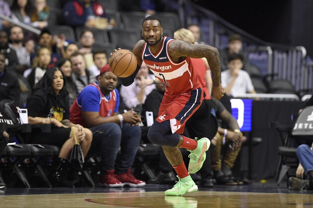 Washington Wizards guard John Wall (2) dribbles the ball during the first half of an NBA basketball game against the Brooklyn Nets, Saturday, Dec. 1, 2018, in Washington. (AP Photo/Nick Wass)