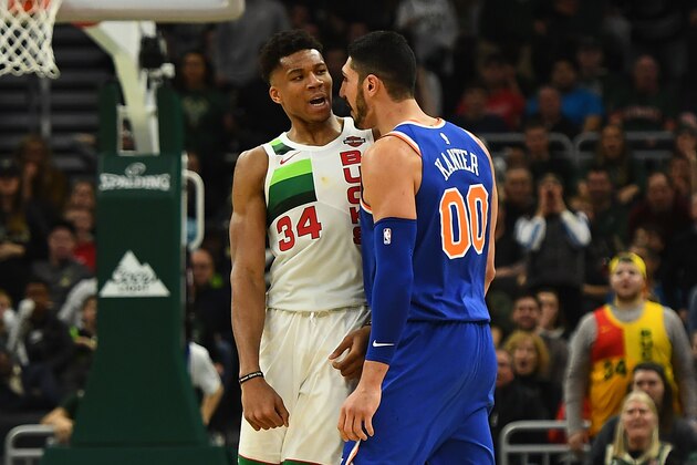 MILWAUKEE, WISCONSIN - DECEMBER 27:  Giannis Antetokounmpo #34 of the Milwaukee Bucks and Enes Kanter #00 of the New York Knicks exchange words during the second half of a game at Fiserv Forum on December 27, 2018 in Milwaukee, Wisconsin. Enes Kanter #00 was ejected from the game.  NOTE TO USER: User expressly acknowledges and agrees that, by downloading and or using this photograph, User is consenting to the terms and conditions of the Getty Images License Agreement. (Photo by Stacy Revere/Getty Images)
