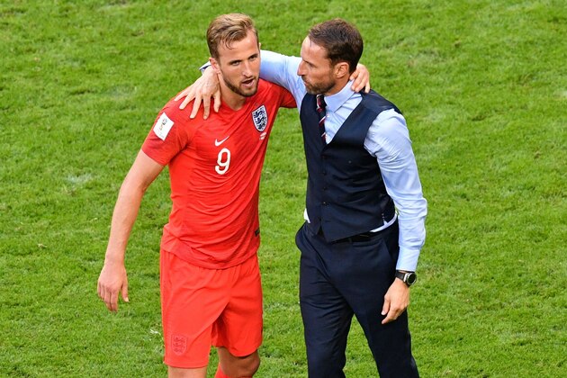 England's coach Gareth Southgate (R) and England's forward Harry Kane celebrate after winning during the Russia 2018 World Cup quarter-final football match between Sweden and England at the Samara Arena in Samara on July 7, 2018. (Photo by Alexander NEMENOV / AFP) / RESTRICTED TO EDITORIAL USE - NO MOBILE PUSH ALERTS/DOWNLOADS        (Photo credit should read ALEXANDER NEMENOV/AFP/Getty Images)