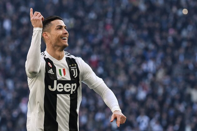 Juventus' Portuguese forward Cristiano Ronaldo celebrates after opening the scoring during the Italian Serie A football match Juventus vs Sampdoria on December 29, 2018 at the Juventus stadium in Turin. (Photo by Marco BERTORELLO / AFP)        (Photo credit should read MARCO BERTORELLO/AFP/Getty Images)