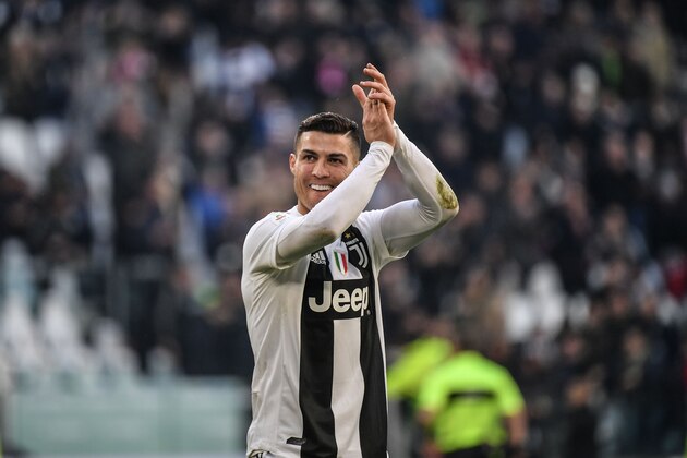 Juventus' Portuguese forward Cristiano Ronaldo celebrates at the end of the Italian Serie A football match Juventus vs Sampdoria on December 29, 2018 at the Juventus stadium in Turin. (Photo by Marco BERTORELLO / AFP)        (Photo credit should read MARCO BERTORELLO/AFP/Getty Images)