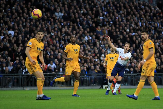 LONDON, ENGLAND - DECEMBER 29:  Harry Kane of Tottenham Hotspur scores his team's first goal during the Premier League match between Tottenham Hotspur and Wolverhampton Wanderers at Tottenham Hotspur Stadium on December 29, 2018 in London, United Kingdom.  (Photo by Marc Atkins/Getty Images)