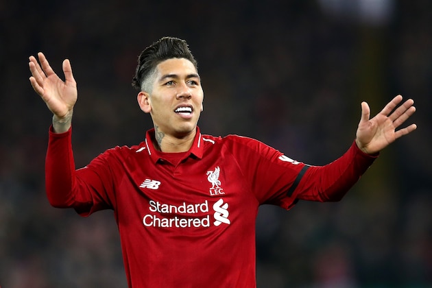 LIVERPOOL, ENGLAND - DECEMBER 29:  Roberto Firmino of Liverpool celebrates after scoring his sides first goal during the Premier League match between Liverpool FC and Arsenal FC at Anfield on December 29, 2018 in Liverpool, United Kingdom.  (Photo by Clive Brunskill/Getty Images)