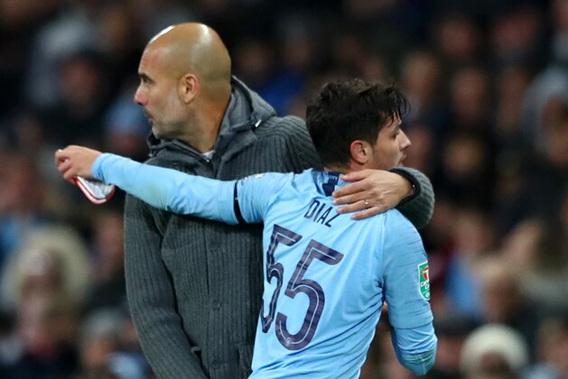 MANCHESTER, ENGLAND - NOVEMBER 01:  Brahim Diaz of Manchester City speaks with Josep Guardiola, Manager of Manchester City as he is substituted off during the Carabao Cup Fourth Round match between Manchester City and Fulham at Etihad Stadium on November 1, 2018 in Manchester, England.  (Photo by Matthew Lewis/Getty Images)