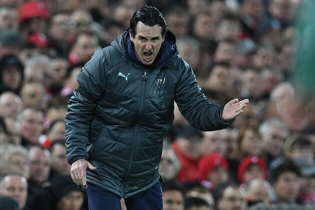 Arsenal's Spanish head coach Unai Emery shouts instructions to his players from the touchline during the English Premier League football match between Liverpool and Arsenal at Anfield in Liverpool, north west England on December 29, 2018. (Photo by Paul ELLIS / AFP) / RESTRICTED TO EDITORIAL USE. No use with unauthorized audio, video, data, fixture lists, club/league logos or 'live' services. Online in-match use limited to 120 images. An additional 40 images may be used in extra time. No video emulation. Social media in-match use limited to 120 images. An additional 40 images may be used in extra time. No use in betting publications, games or single club/league/player publications. /         (Photo credit should read PAUL ELLIS/AFP/Getty Images)