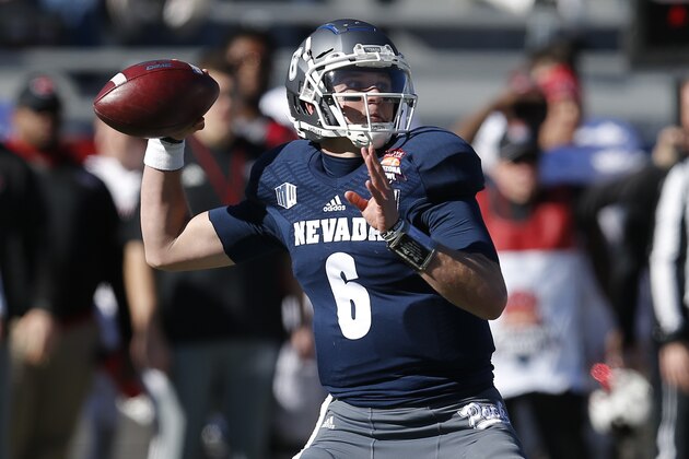 Nevada quarterback Ty Gangi (6) throws down field in the first half of the Arizona Bowl NCAA college football game against Arkansas State, Saturday, Dec. 29, 2018, in Tucson, Ariz. (AP Photo/Rick Scuteri)