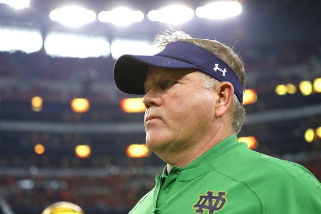 ARLINGTON, TEXAS - DECEMBER 29: Head coach Brian Kelly of the Notre Dame Fighting Irish takes the field with his team before the game against the Clemson Tigers during the College Football Playoff Semifinal Goodyear Cotton Bowl Classic at AT&T Stadium on December 29, 2018 in Arlington, Texas. (Photo by Kevin C.  Cox/Getty Images)