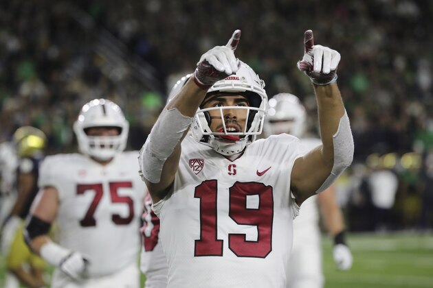 Stanford wide receiver JJ Arcega-Whiteside points to the fans after scoring on a 4-yard reception during the first half of an NCAA college football game against Notre Dame, Saturday, Sept. 29, 2018, in South Bend, Ind. (AP Photo/Carlos Osorio)