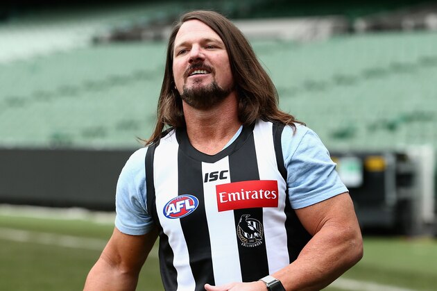 MELBOURNE, AUSTRALIA - JUNE 24: Smackdown women's champion Carmella and WWE'S world champion AJ Styles show their football skills at the Melbourne Cricket Ground on June 24, 2018 in Melbourne, Australia. (Photo by Robert Prezioso/Getty Images)