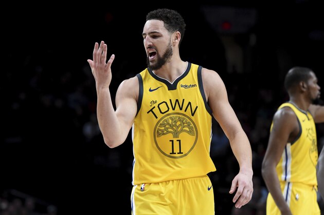 Golden State Warriors guard Klay Thompson reacts after hitting a shot late in the second half of the team's NBA basketball game against the Portland Trail Blazers in Portland, Ore., Saturday, Dec. 29, 2018. The Warriors won 115-105. (AP Photo/Steve Dykes)