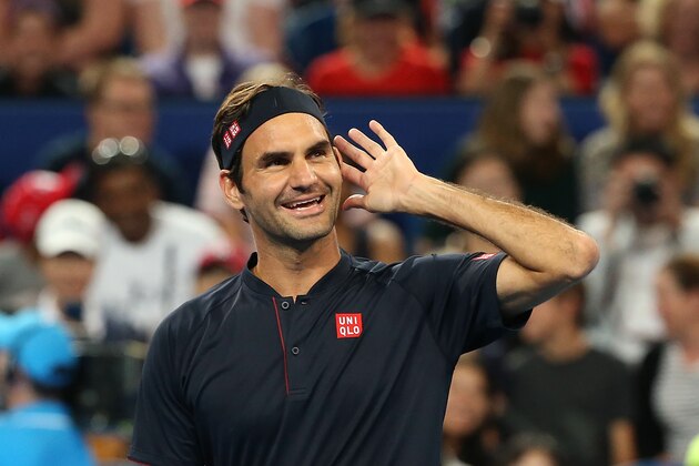 PERTH, AUSTRALIA - DECEMBER 30: Roger Federer of Switzerland gestures to a spectator in the mixed doubles match against Katie Boulter Cameron Norrie of Great Britain during day two of the 2019 Hopman Cup at RAC Arena on December 30, 2018 in Perth, Australia. (Photo by Paul Kane/Getty Images)