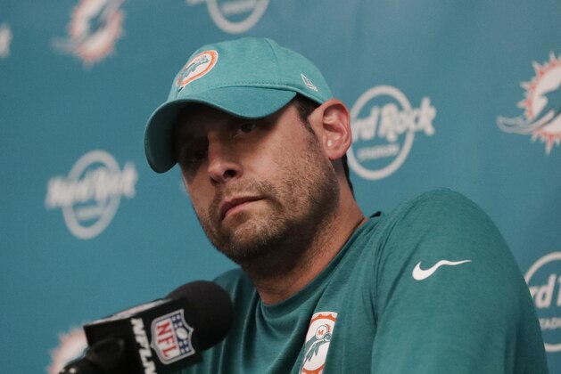 Miami Dolphins head coach Adam Gase talks during a post game news conference, after an NFL football game, Sunday, Dec. 23, 2018, in Miami Gardens, Fla. The Jaguars defeated the Dolphins 17-7.(AP Photo/Brynn Anderson)