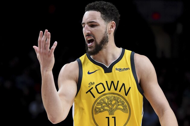 Golden State Warriors guard Klay Thompson reacts after hitting a shot late in the second half of the team's NBA basketball game against the Portland Trail Blazers in Portland, Ore., Saturday, Dec. 29, 2018. The Warriors won 115-105. (AP Photo/Steve Dykes)