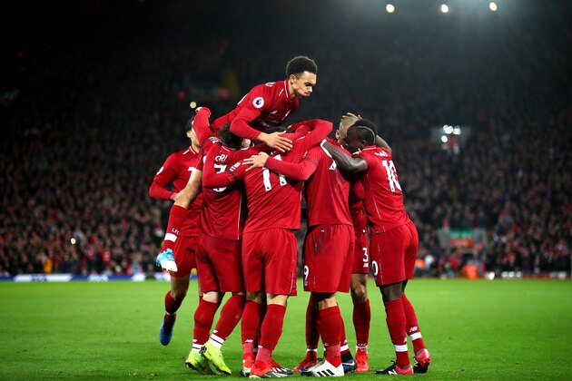 LIVERPOOL, ENGLAND - DECEMBER 29:  Roberto Firmino of Liverpool celebrates with team mates after scoring his sides second goal during the Premier League match between Liverpool FC and Arsenal FC at Anfield on December 29, 2018 in Liverpool, United Kingdom.  (Photo by Clive Brunskill/Getty Images)