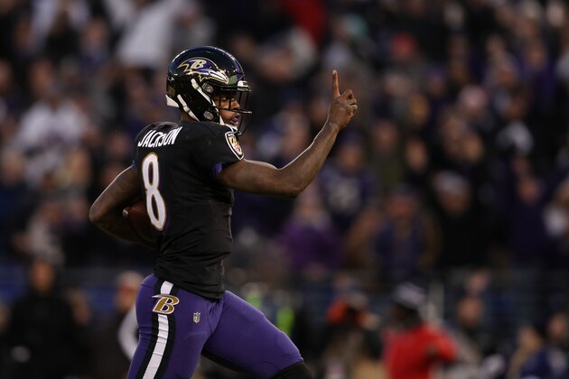 BALTIMORE, MARYLAND - DECEMBER 30: Quarterback Lamar Jackson #8 of the Baltimore Ravens reacts as he runs for a touchdown in the first quarter against the Cleveland Browns at M&T Bank Stadium on December 30, 2018 in Baltimore, Maryland. (Photo by Patrick Smith/Getty Images)
