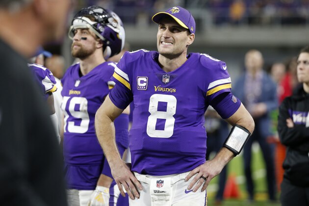 Minnesota Vikings quarterback Kirk Cousins (8) watches from the bench during the second half of an NFL football game against the Chicago Bears, Sunday, Dec. 30, 2018, in Minneapolis. (AP Photo/Bruce Kluckhohn)