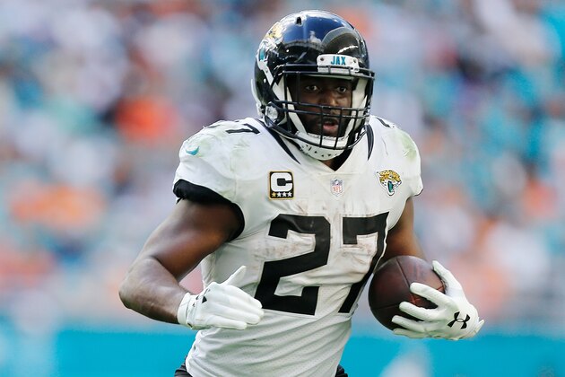 MIAMI, FL - DECEMBER 23:  Leonard Fournette #27 of the Jacksonville Jaguars runs with the ball against the Miami Dolphins at Hard Rock Stadium on December 23, 2018 in Miami, Florida.  (Photo by Michael Reaves/Getty Images)