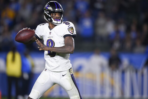 Baltimore Ravens quarterback Lamar Jackson looks to pass during the first half of an NFL football game against the Los Angeles Chargers in Carson, Calif., Sunday, Dec. 23, 2018. (AP Photo/Kelvin Kuo)