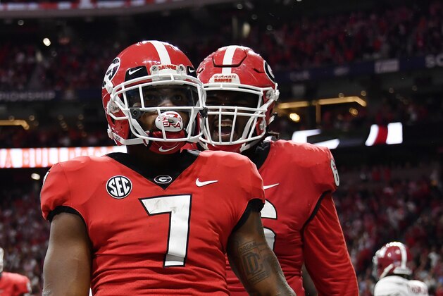 Georgia running back D'Andre Swift (7) celebrates his touchdown against Alabama during the first half of the Southeastern Conference championship NCAA college football game, Saturday, Dec. 1, 2018, in Atlanta. (AP Photo/John Amis)