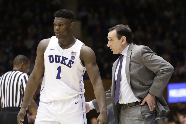 Duke's Zion Williamson speaks with coach Mike Krzyzewski during the second half of an NCAA college basketball game against Princeton in Durham, N.C., Tuesday, Dec. 18, 2018. (AP Photo/Gerry Broome)