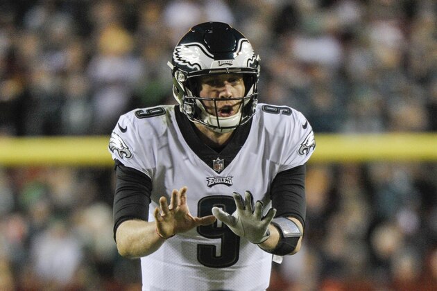 Philadelphia Eagles quarterback Nick Foles (9) calls for the snap during the first half of the NFL football game between the Washington Redskins and the Philadelphia Eagles, Sunday, Dec. 30, 2018 in Landover, Md. (AP Photo/Mark Tenally)