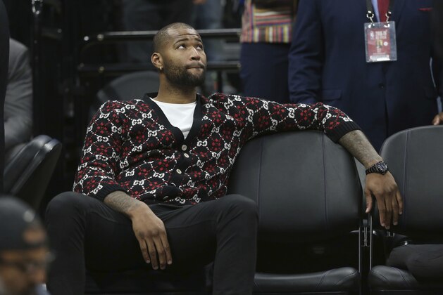Golden State Warriors center DeMarcus Cousins looks up at the scoreboard during the second half of an NBA basketball game against the his former team, the Sacramento Kings Friday, Dec. 14, 2018, in Sacramento, Calif. The Warriors won 130-125. Cousins has yet to play a game for the Warriors as he rehabs an Achilles injury. (AP Photo/Rich Pedroncelli) Golden State Warriors center DeMarcus Cousins looks up at the scoreboard during the second half of an NBA basketball game against the his former team, the Sacramento Kings Friday, Dec. 14, 2018, in Sacramento, Calif. The Warriors won 130-125. Cousins has yet to play a game for the Warriors as he rehabs an Achilles injury. (AP Photo/Rich Pedroncelli)