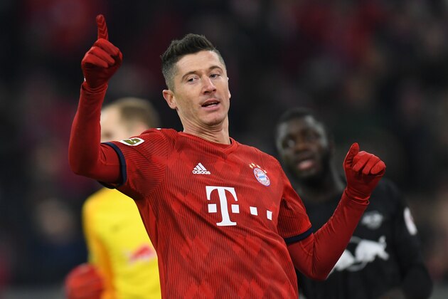Bayern Munich's Polish striker Robert Lewandowski gestures during the German first division Bundesliga football match Bayern Munich vs RB Leipzig in Munich, southern Germany, on December 19, 2018. (Photo by Christof STACHE / AFP) / DFL REGULATIONS PROHIBIT ANY USE OF PHOTOGRAPHS AS IMAGE SEQUENCES AND/OR QUASI-VIDEO        (Photo credit should read CHRISTOF STACHE/AFP/Getty Images)