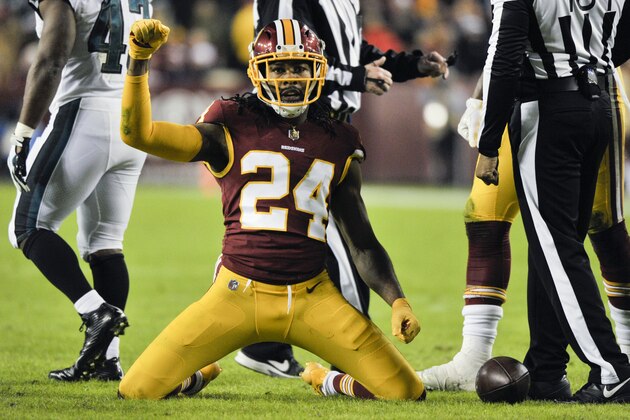 Washington Redskins cornerback Josh Norman (24) reacts to his play during the first half of the NFL football game between the Washington Redskins and the Philadelphia Eagles, Sunday, Dec. 30, 2018 in Landover, Md. (AP Photo/Mark Tenally)