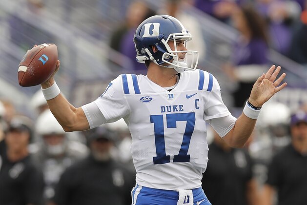 FILE - In this Sept. 8, 2018, file photo, Duke's Daniel Jones makes a pass against Northwestern during the first half of an NCAA college football game, in Evanston, Ill. Duke has to replace its most irreplaceable player. Quarterback Daniel Jones, who took virtually every meaningful snap for the Blue Devils over the past two-plus seasons, is out indefinitely and now they must figure out a way to win with backup Quentin Harris. (AP Photo/Jim Young, File)