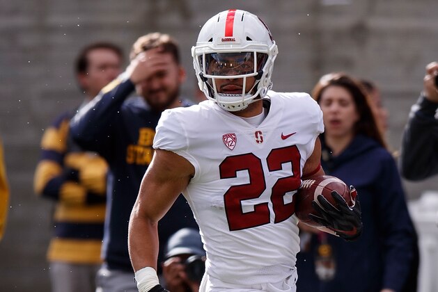 BERKELEY, CA - DECEMBER 01: Running back Cameron Scarlett #22 of the Stanford Cardinal rushes up field for a touchdown against the California Golden Bears during the first quarter at California Memorial Stadium on December 1, 2018 in Berkeley, California. The Stanford Cardinal defeated the California Golden Bears 23-13. (Photo by Jason O. Watson/Getty Images)