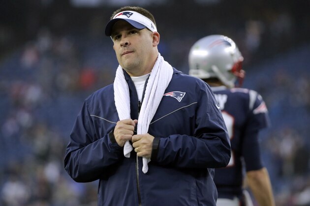 New England Patriots offensive coordinator Josh McDaniels watches his team warm up before an NFL football game against the Minnesota Vikings, Sunday, Dec. 2, 2018, in Foxborough, Mass. (AP Photo/Elise Amendola)