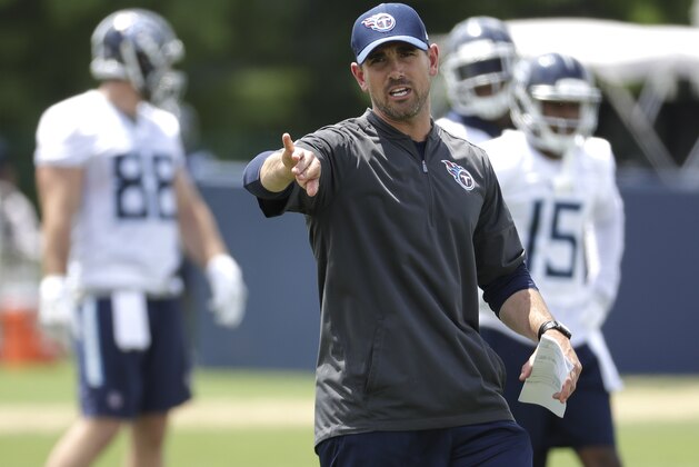 Tennessee Titans offensive coordinator Matt LaFleur runs a drill during an organized team activity at the Titans' NFL football training facility Tuesday, May 22, 2018, in Nashville, Tenn. (AP Photo/Mark Humphrey)